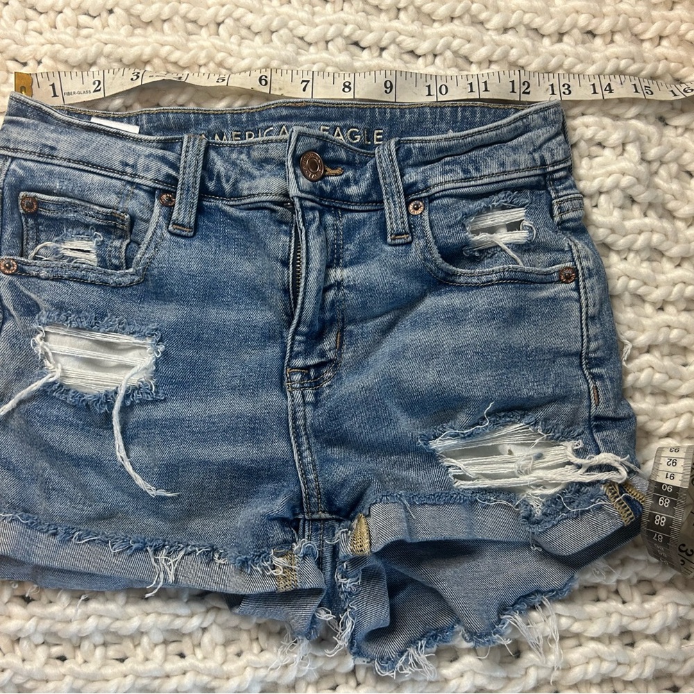American Eagle Outfitters Ripped Light Blue Jean Shorts